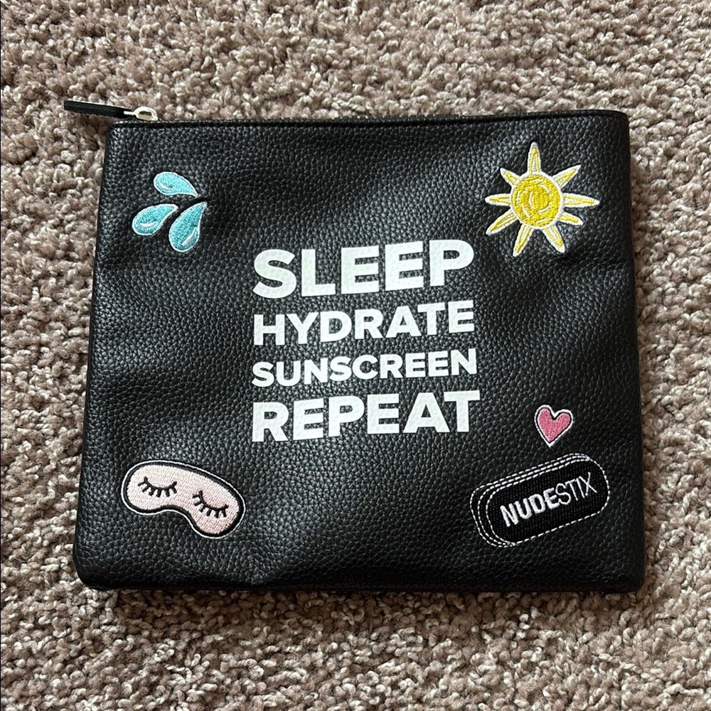 NUDESTIX Black Pouch with Colorful Patches